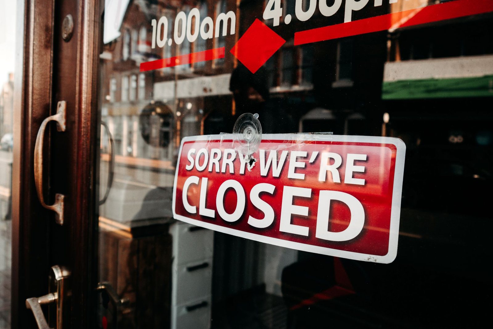 A closed storefront sign, representing retiring or winding down a business.